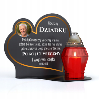 Čierny stojan pre Znnicz so sochou na malom hrobe